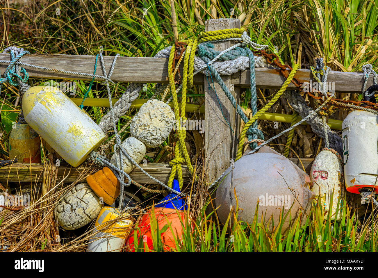 Fishing floats on a seaside home fence, Oregon coast Stock Photo Alamy