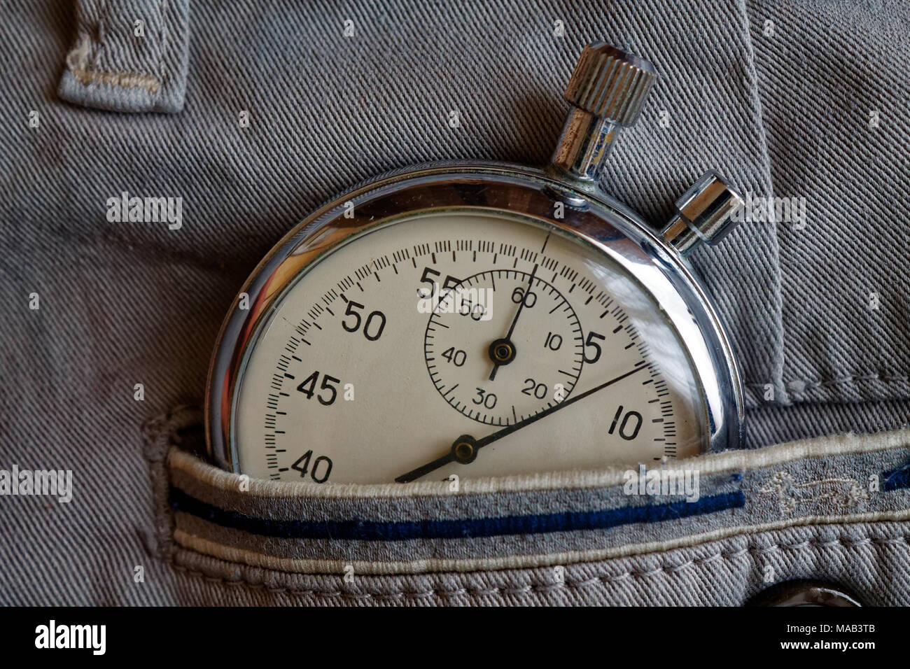 Vintage antiques Stopwatch, in gray denim pocket with blue line, value