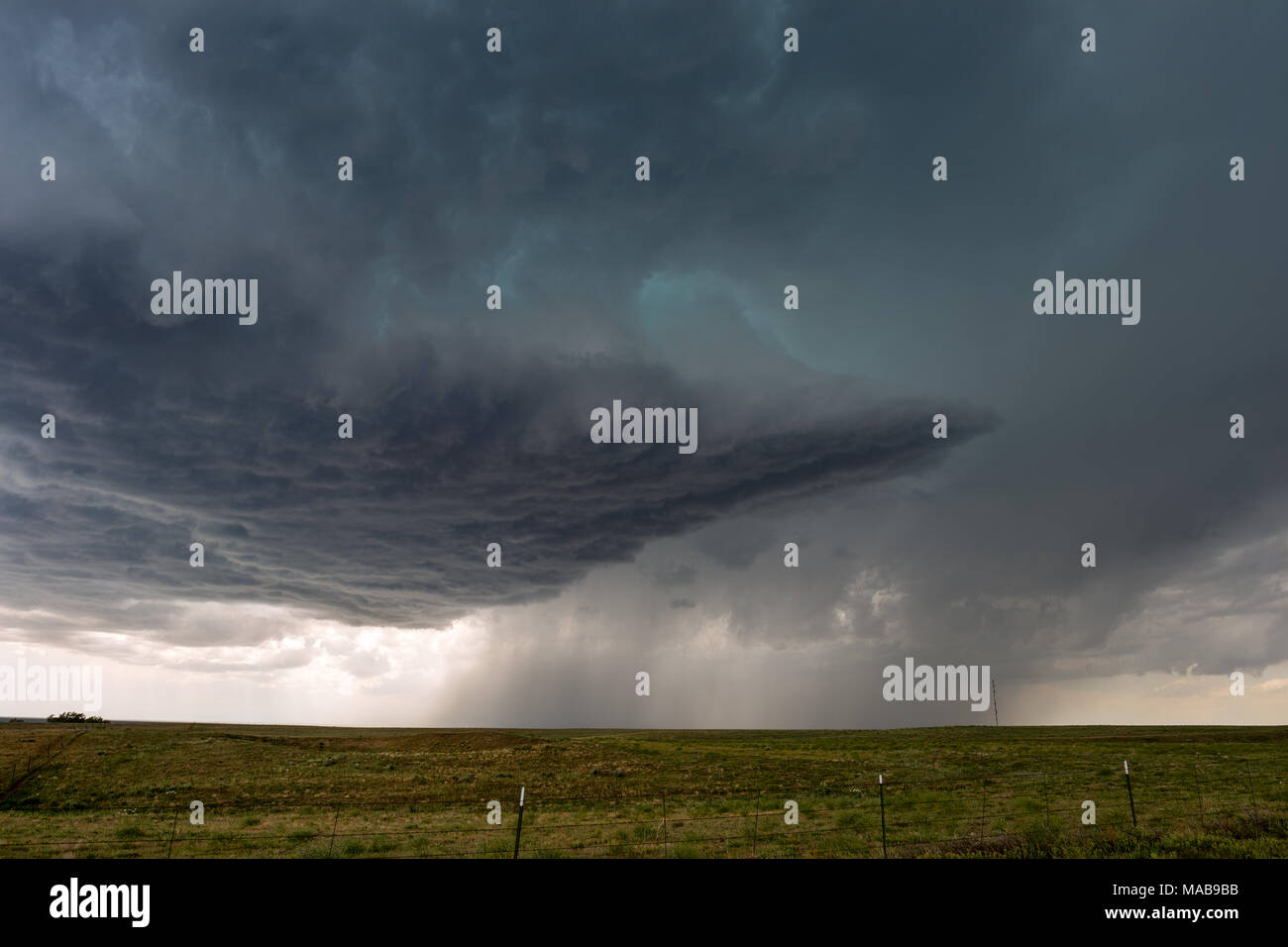 Dark storm clouds from a severe thunderstorm in the plains near Eads, Colorado Stock Photo
