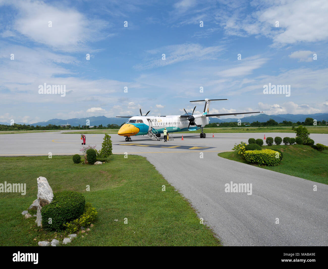 Airbus twin propeller from Don Mueang international airport landing on