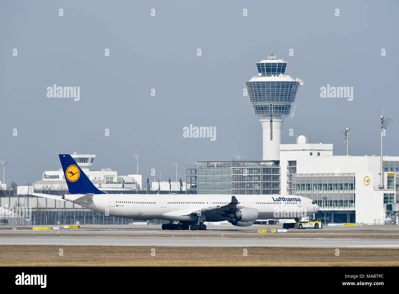 Lufthansa, Airbus, A340, 600, A340-600, Push Back Truck, pushing, Roll In, Landing, Position, clearance, View, Terminal 2, Tower, Munich, Airport, MUC Stock Photo