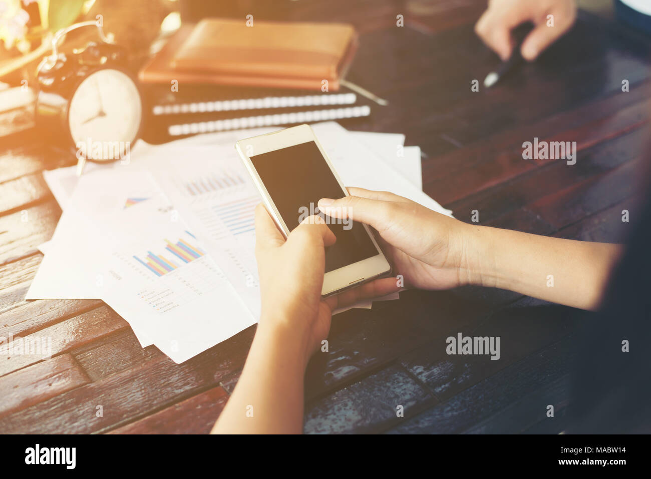 Close-up shot of an analytical team working with the latest financial results, Office life concept. Stock Photo