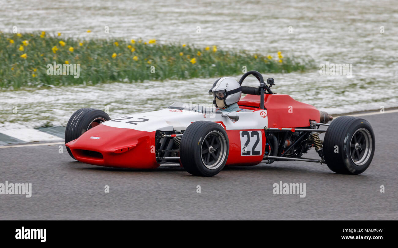 1970 March-Ford 703 Formula 3 with driver Simon Armer during the Derek Bell Cup race at Goodwood 76th Members Meeting, Sussex, UK. Stock Photo
