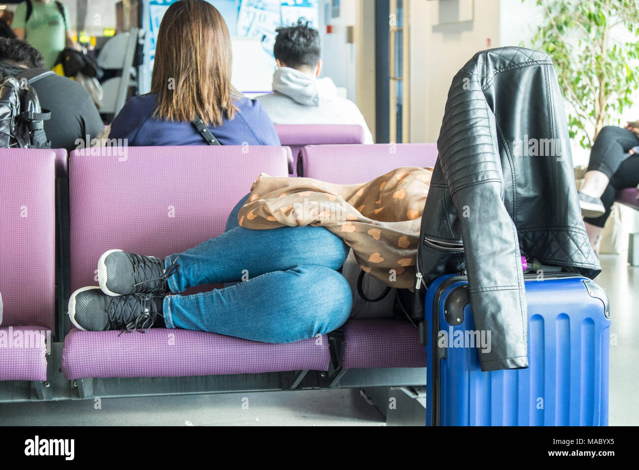 Passengers sleeping airport hi-res stock photography and images - Alamy