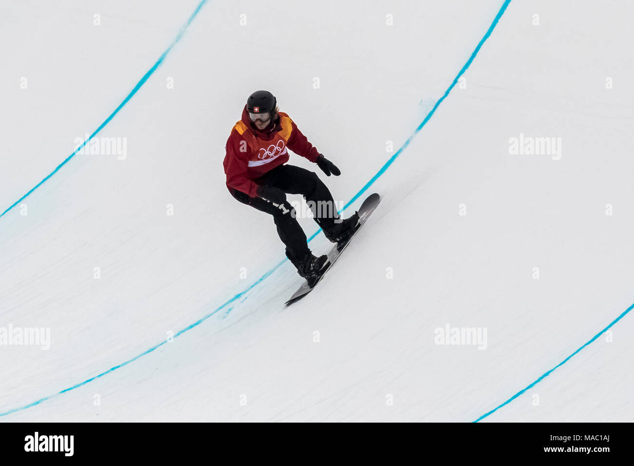 Patrick Burgener (SUI) competing in the Men's Snowboarding Half Pipe