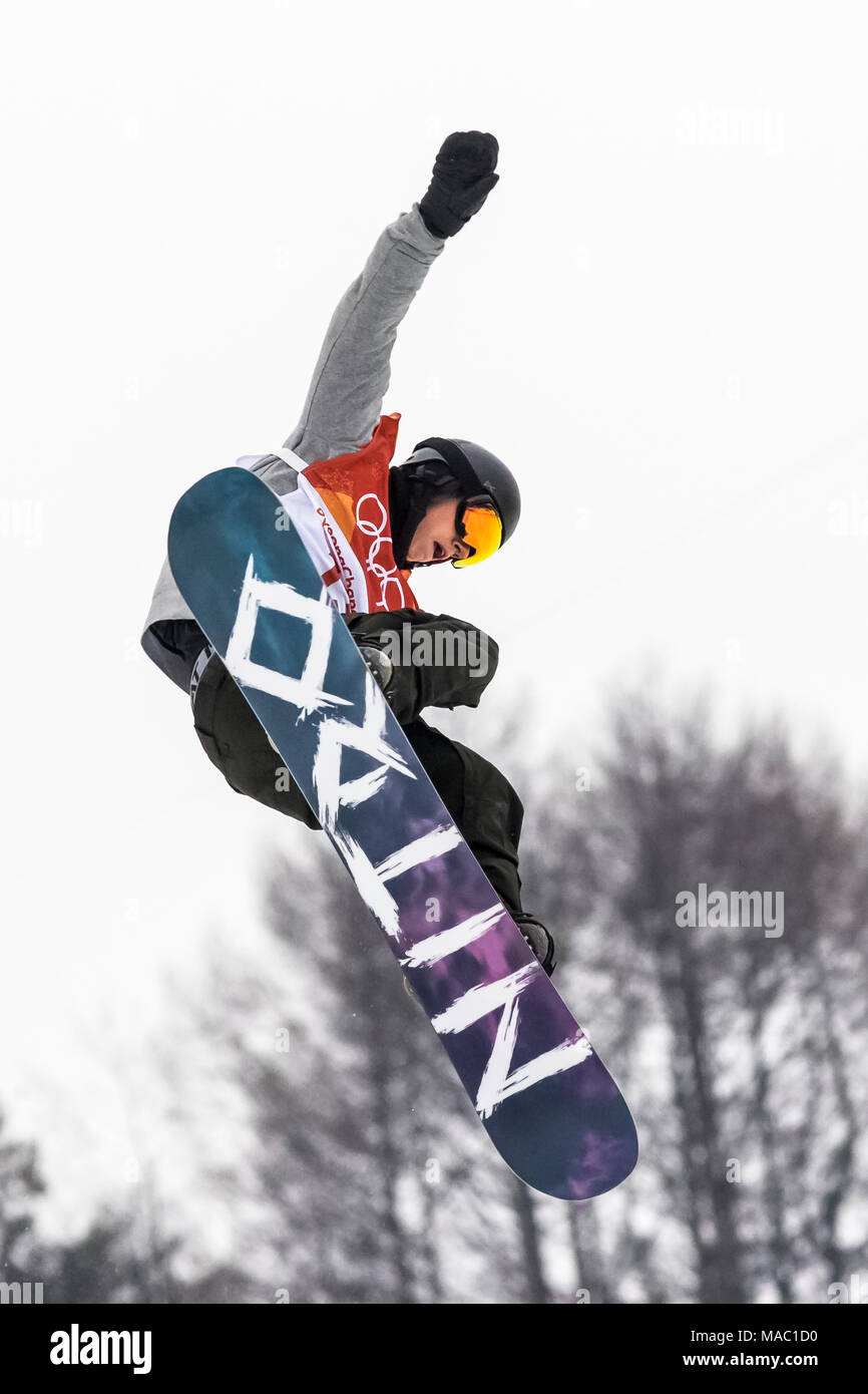 Jan Scherrer (SUI) competing in the Men's Snowboarding Half Pipe Finals at the Olympic Winter