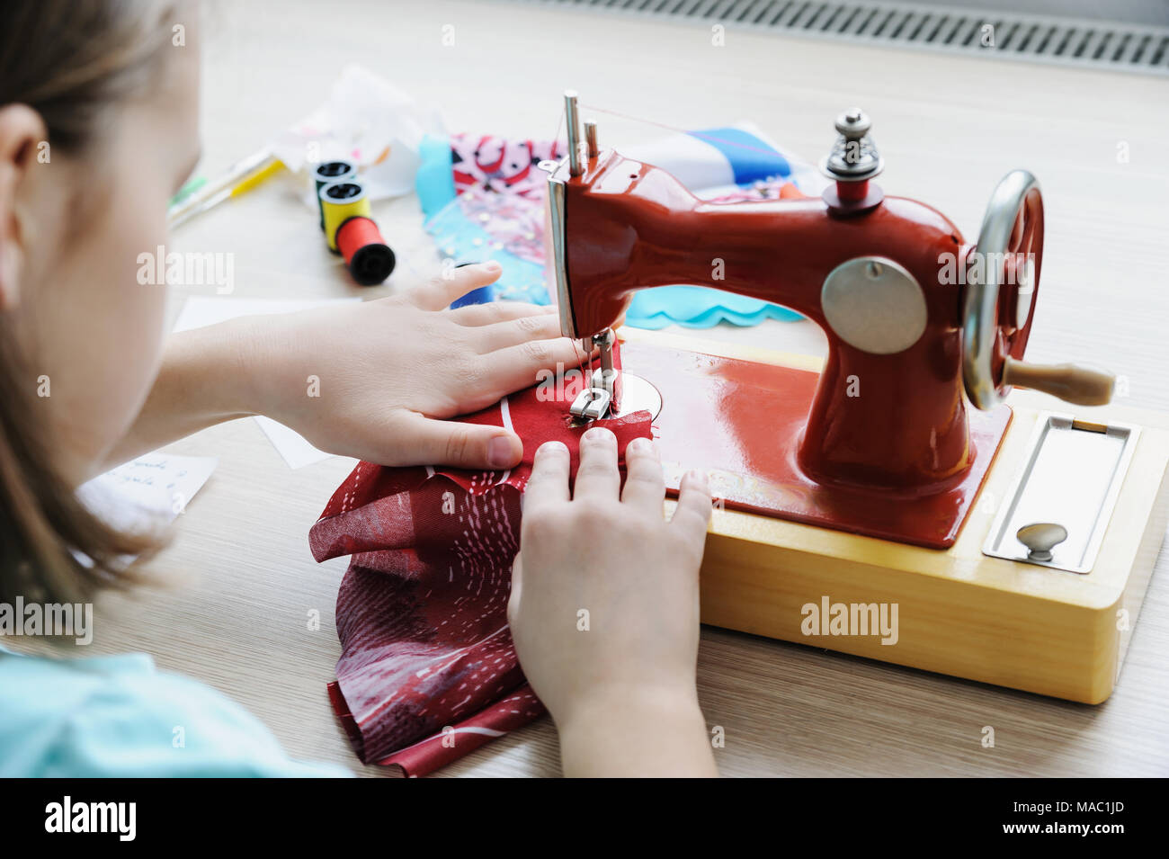 Kid sewing machine hi-res stock photography and images - Page 2 - Alamy