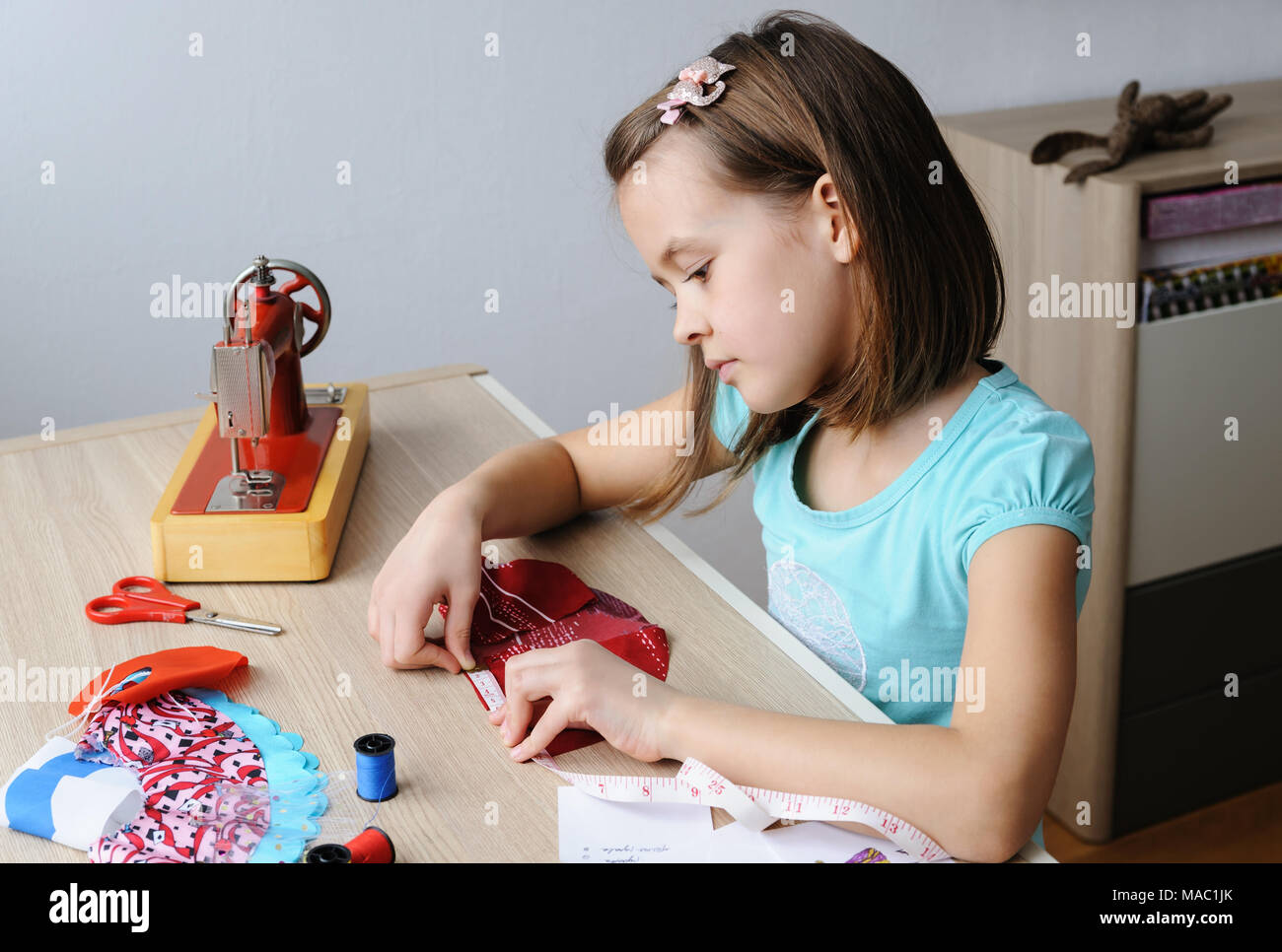 Cloth measuring tape for clothes making Stock Photo - Alamy