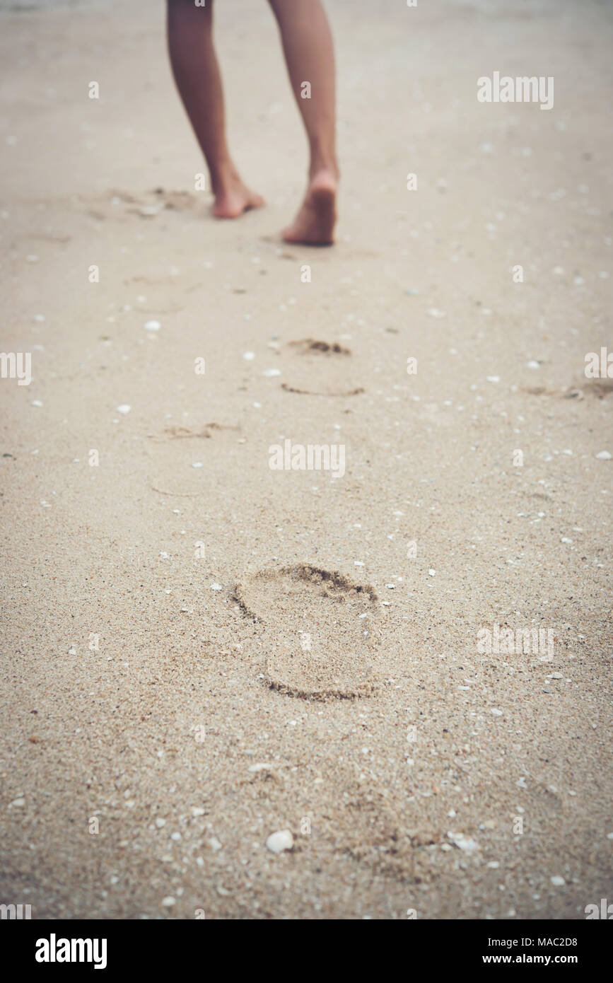 Young woman walking barefoot in hi-res stock photography and images - Alamy