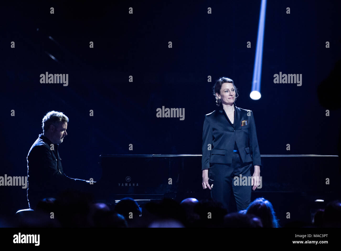 Vancouver, CANADA. 26th March, 2018. Kevin Hearn, Sarah Harmer and Dallas Green perform a tribute to the late Gord Downie at the 2018 Juno Awards. Stock Photo