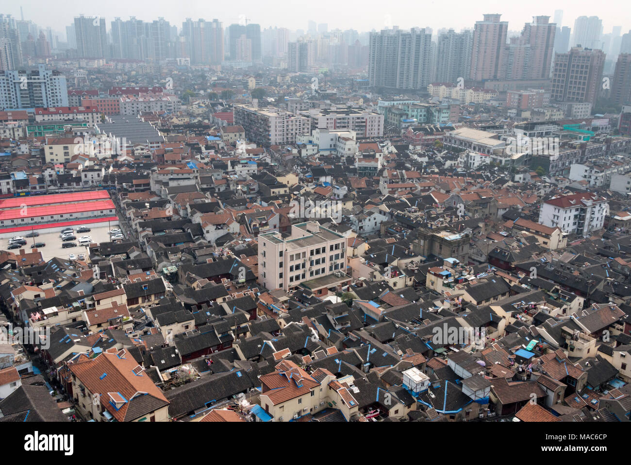 Traditional houses with modern high rises, Pudong, Shanghai, China