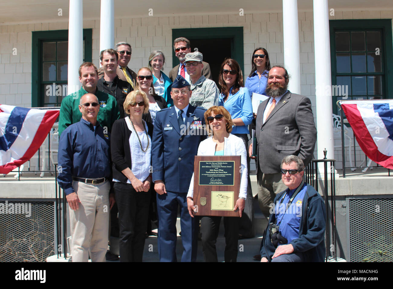 Vandenberg Air Force Base Recognized as 2015 Military Conservation Partner. Vandenberg AFB Conservation team-individual award recipients and staff from Ventura Fish and Wildlife Office.    The U.S. Fish and Wildlife Service recognized Vandenberg Air Force Base as the recipient of the prestigious Military Conservation Award during a ceremony held at the 30th Space Wing in  central California. Stock Photo