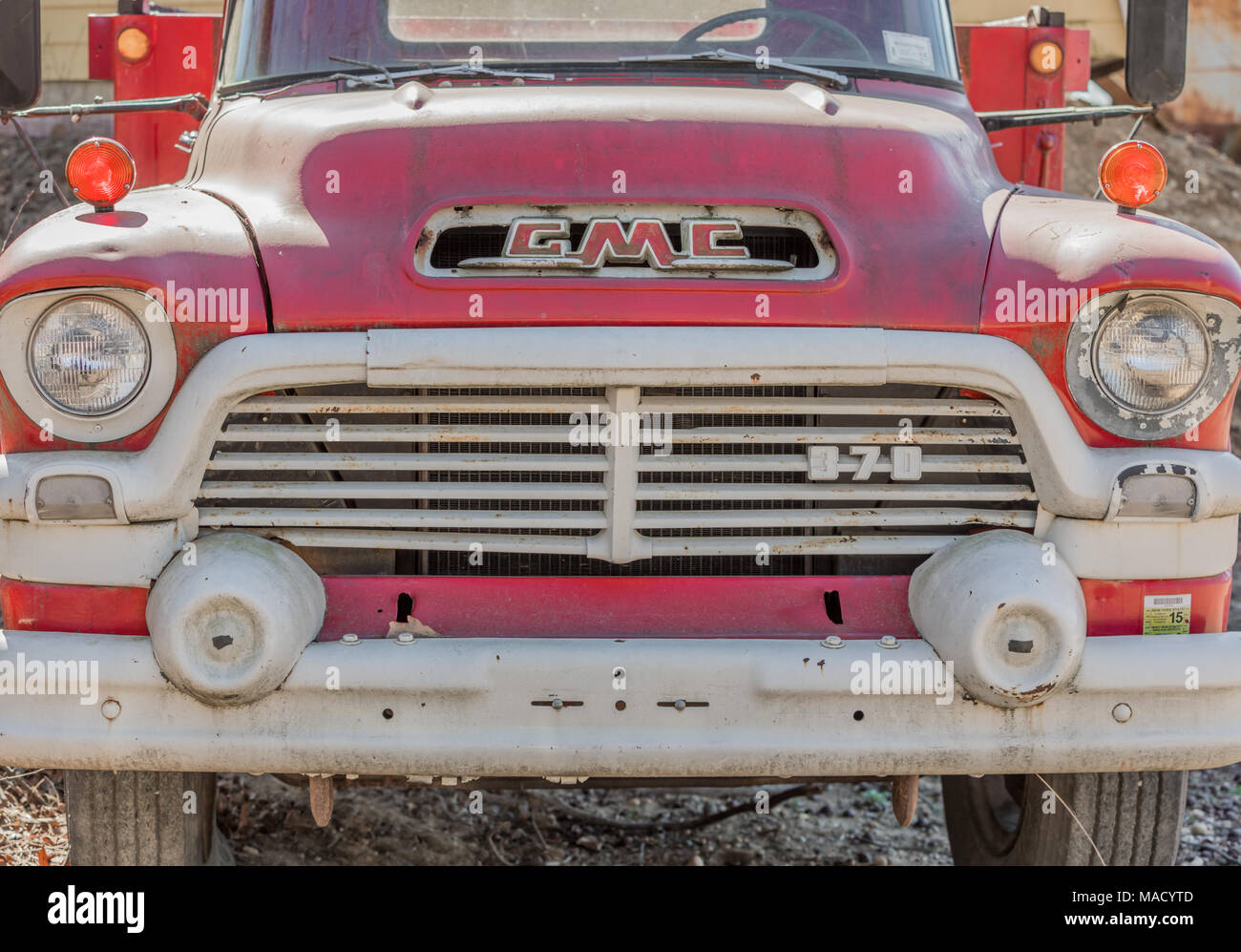 a closeup of the front of an old GMC truck Stock Photo