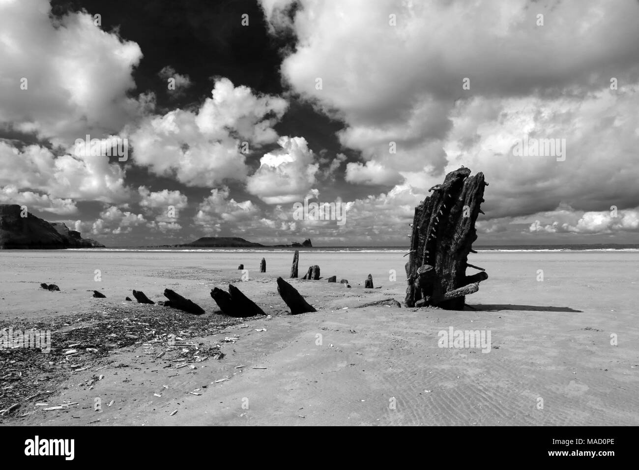Monochrome image of the wreck of the Helvetia on Rhossili Beach, Gower Peninsula, Wales, UK. Stock Photo