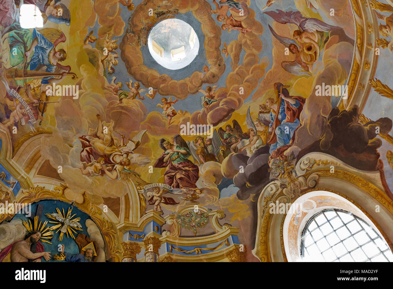Fresco on cupola in the middle church of baroque Calvary in Banska Stiavnica, Slovakia. Angels with the music instruments, 1745. Stock Photo