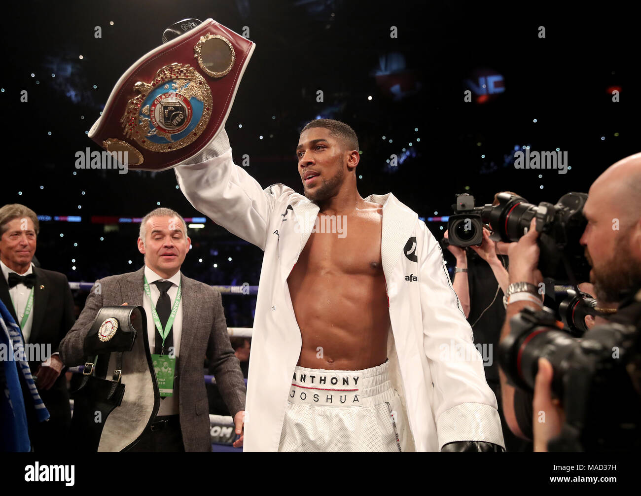 Anthony Joshua celebrates after victory over Joseph Parker in their WBA ...