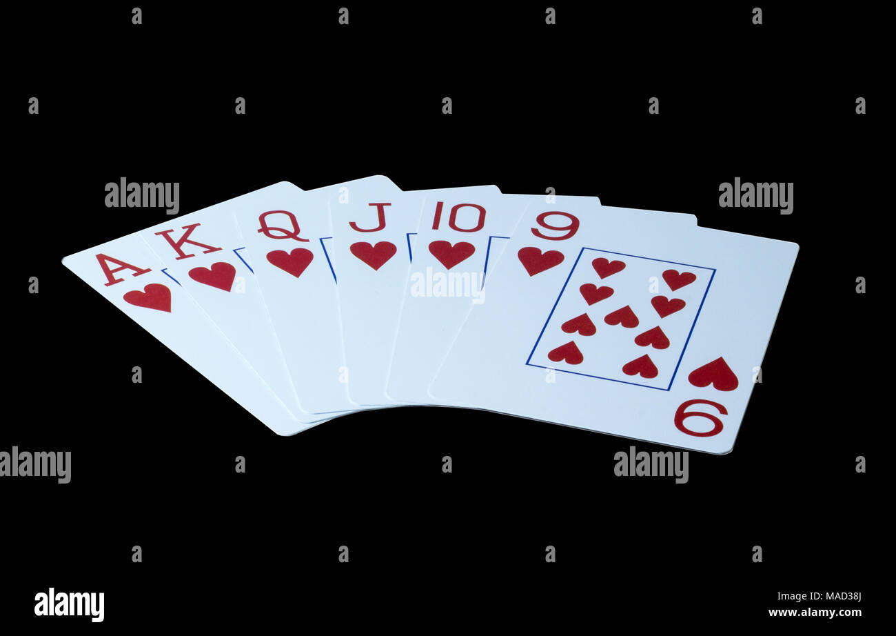 Playing cards on a black background Stock Photo - Alamy