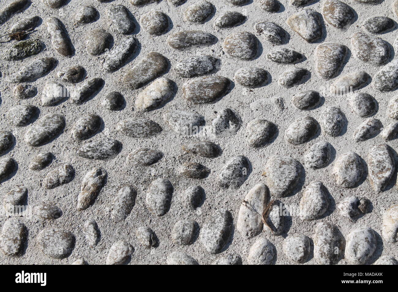 Nice background image of pebbles, round rocks texture Stock Photo - Alamy
