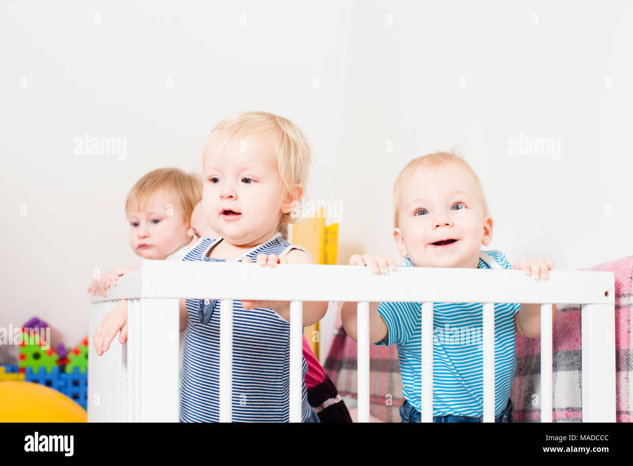 Babies in the crib Stock Photo Alamy