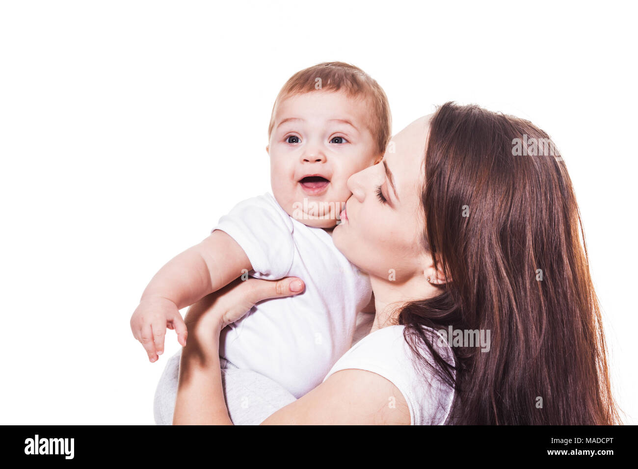 Mother kiss her baby isolated Stock Photo Alamy