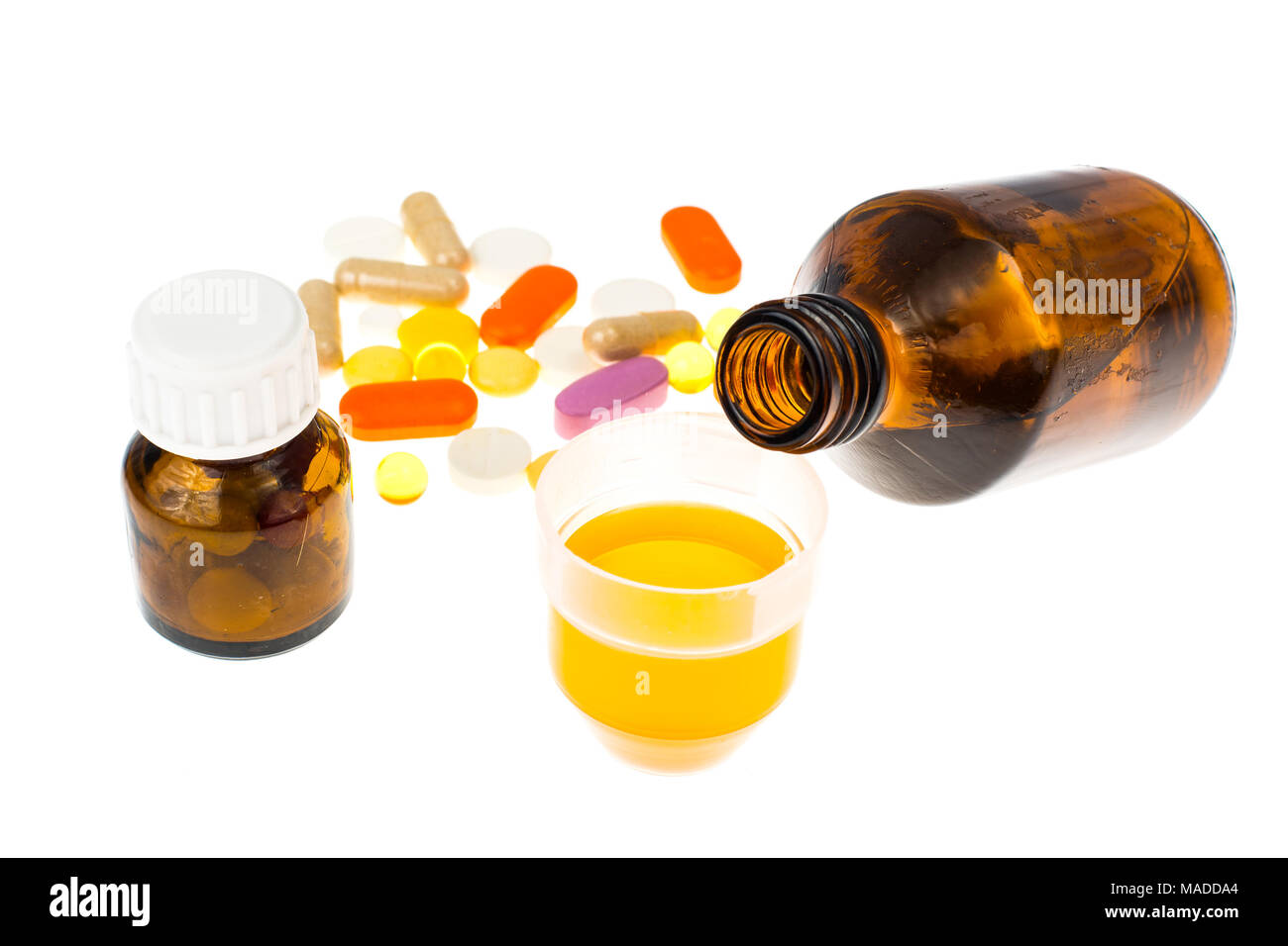 Tablets and syrups forms of medication. Studio Photo Stock Photo