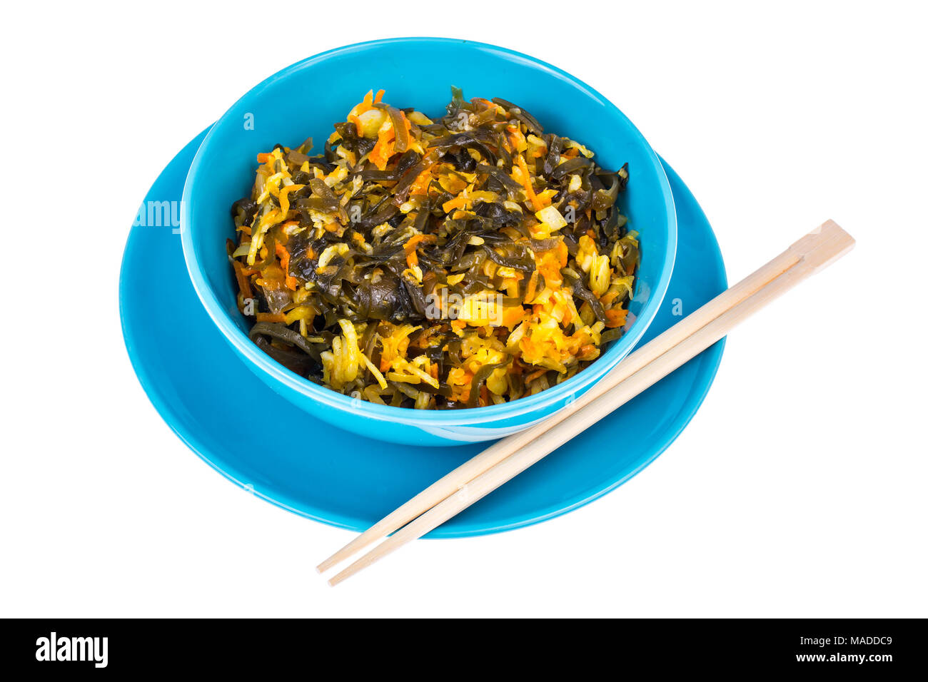 Vegetable salad with sea kale in blue bowl. Studio Photo Stock Photo