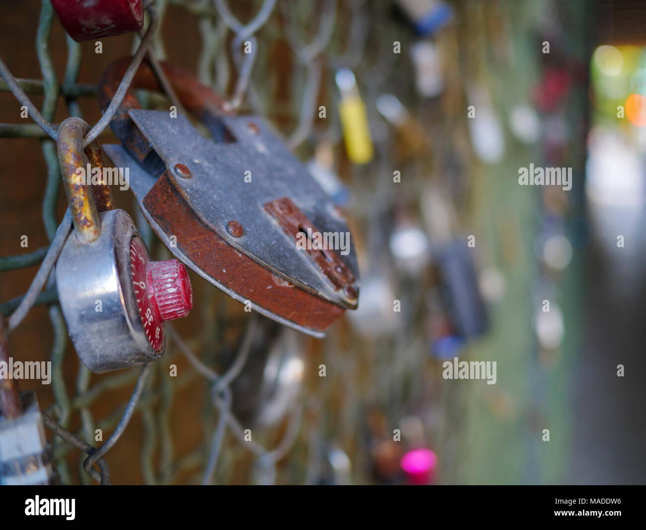 Love locks on chainlink, Oak Park Avenue viaduct. Oak Park, Illinois. Stock Photo