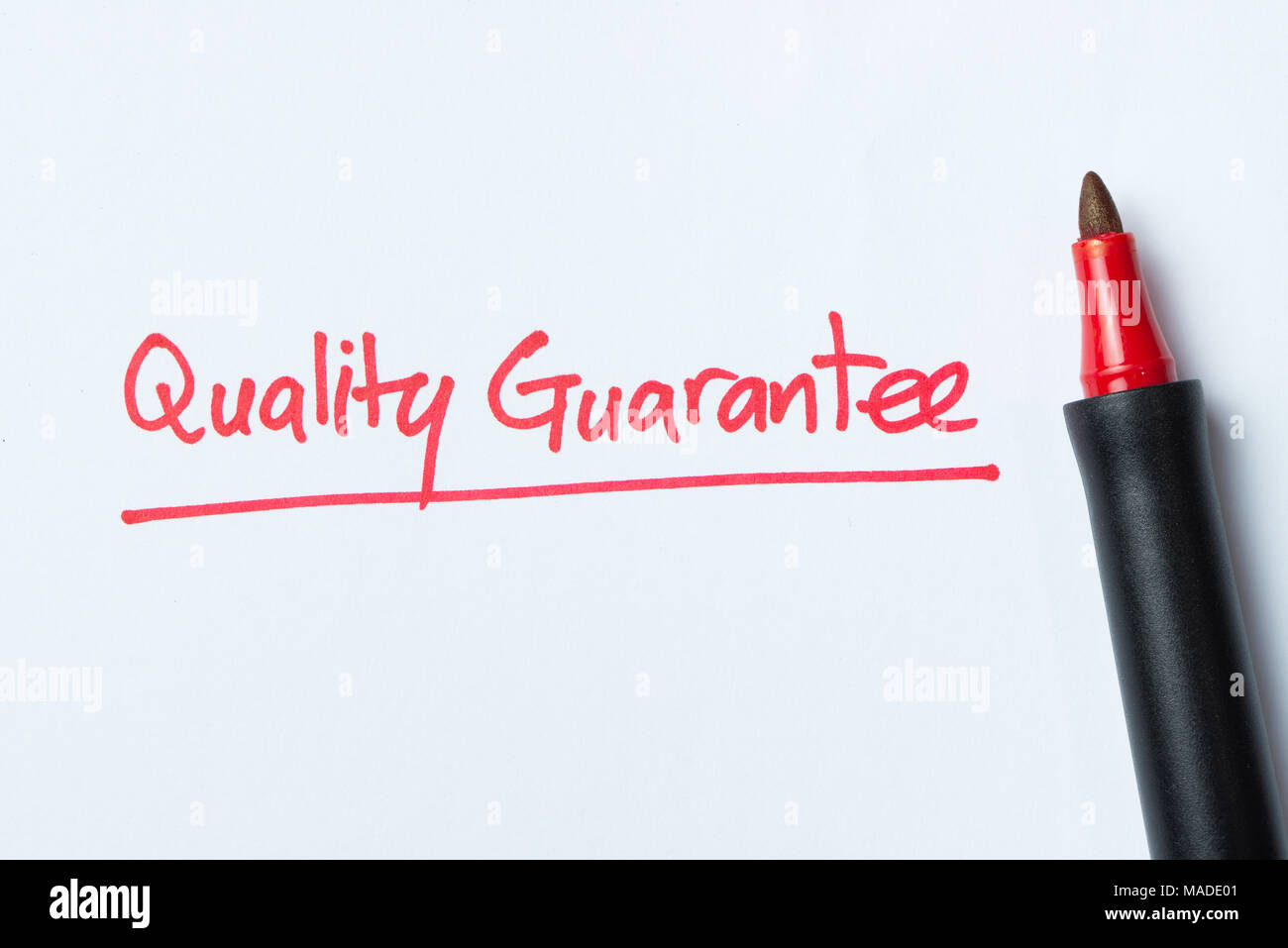 Handwriting of quality guarantee Stock Photo