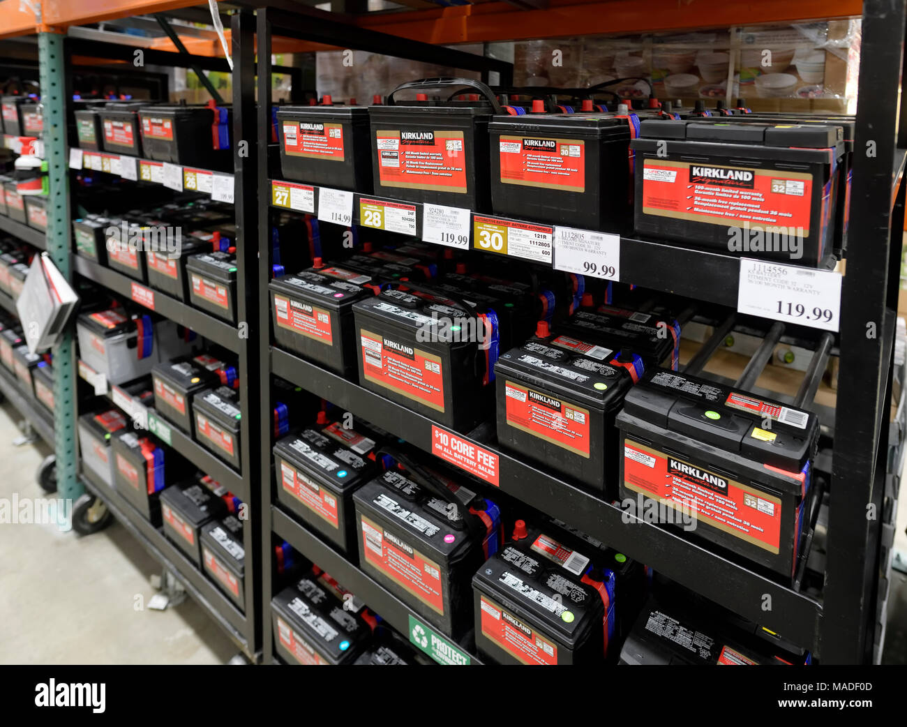 Kirkland brand car batteries on shelves at Costco Wholesale membership