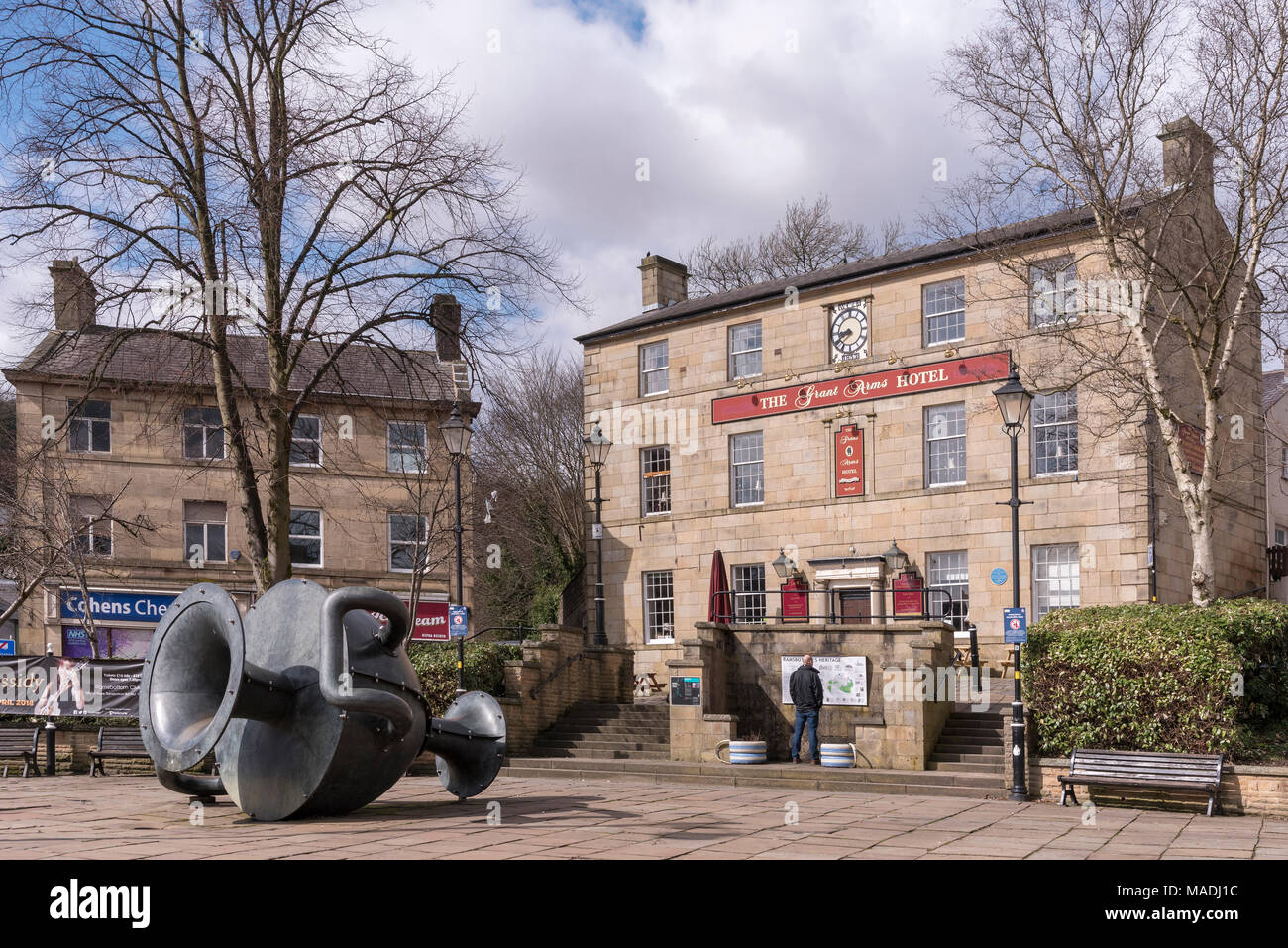 The Market Place in Ramsbottom with large water jug sculptrure part of the Irwell Valley sculpture trail. The Grant Arms hotel. Stock Photo