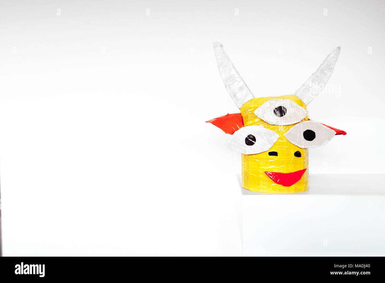 Homemade paper head of a fairy mythical creature on a white background Stock Photo