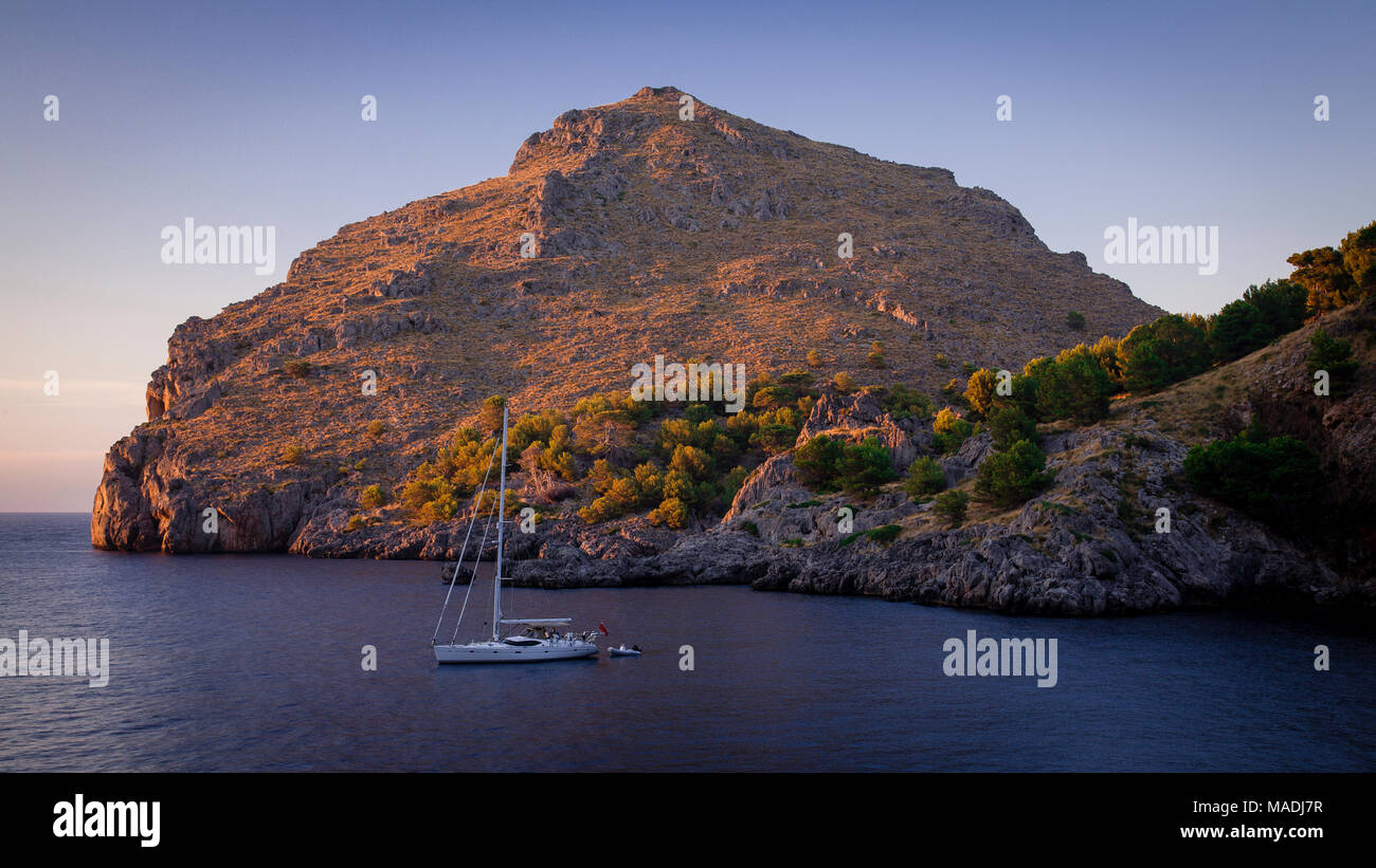 Solitary yacht on the Mediterranean Sea off the coast of Mallorca at sa Calobra Stock Photo