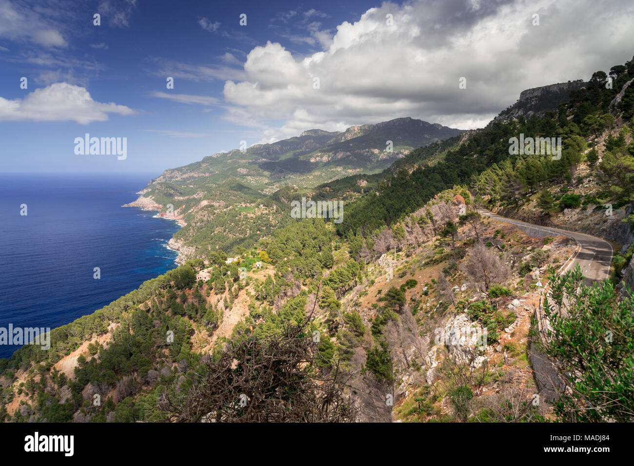 Tramuntana mountains on the Mediterranean coast of Mallorca with clouds and sunshine Stock Photo