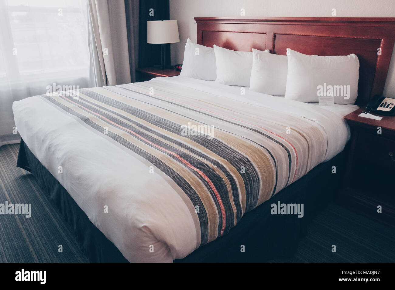 king size hotel bed Stock Photo Alamy