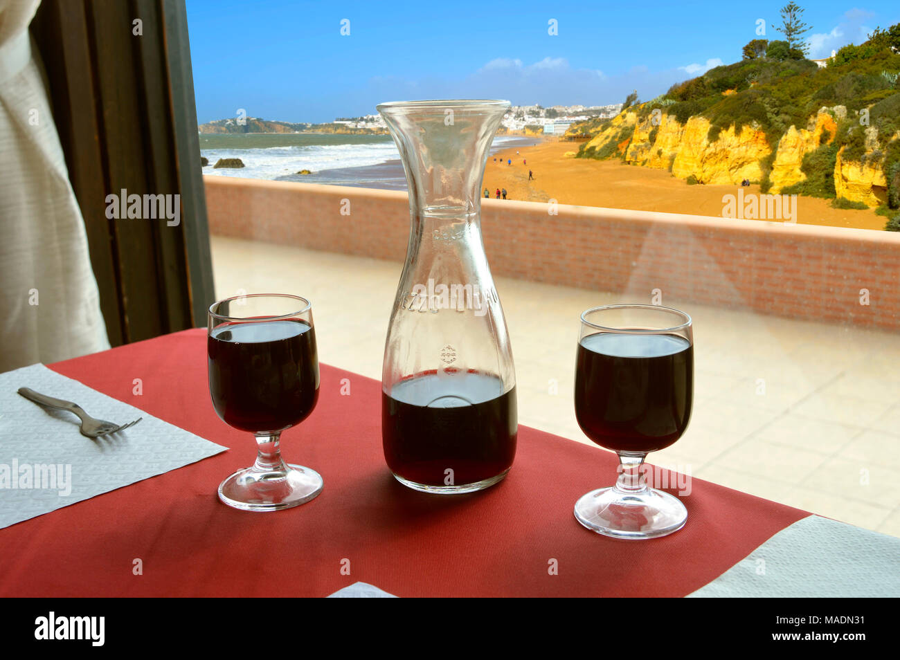 Dining table in a restaurant with red wine Stock Photo Alamy