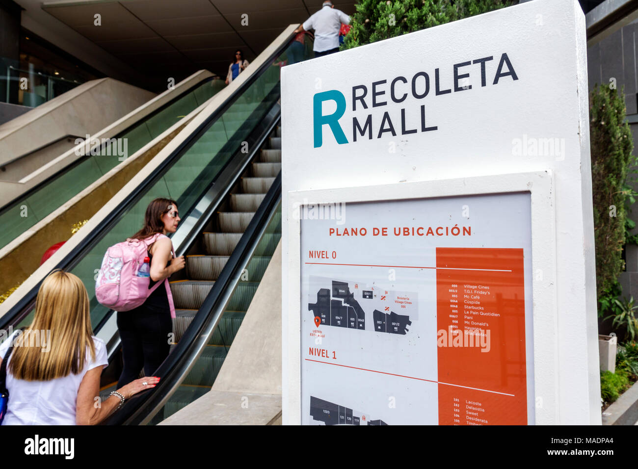 Buenos Aires Argentina,Recoleta mall,entrance,escalator,location,map,adult adults woman women female lady,visitors travel traveling tour tourist touri Stock Photo