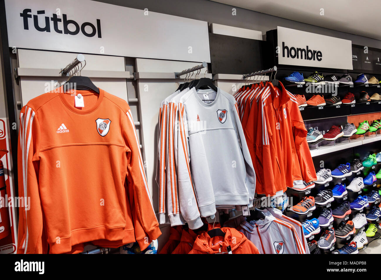 hacha Amante rifle Buenos Aires Argentina,Recoleta mall,Adidas,brand store,athletic  sportswear,sneakers,football jersey,men's,Spanish language sign,visitors  travel trave Stock Photo - Alamy