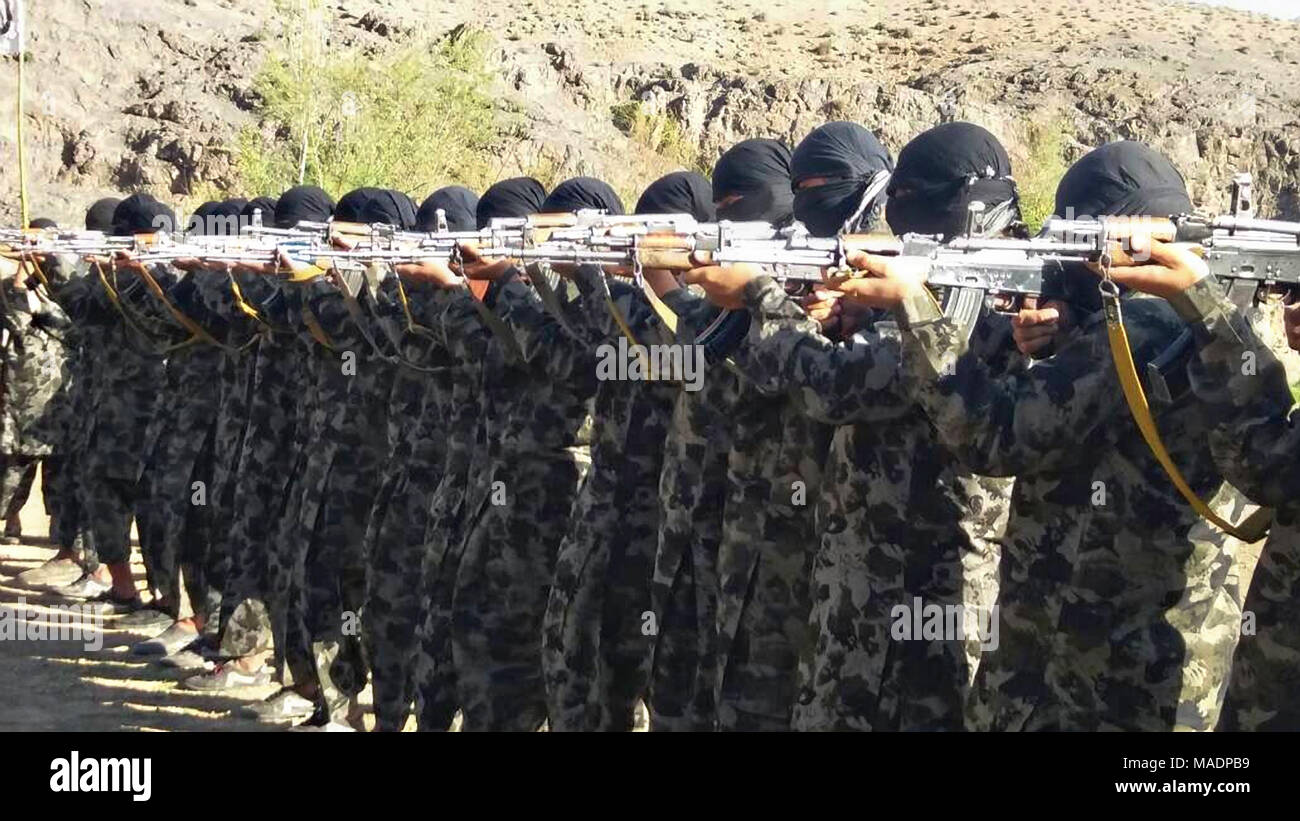 Taliban propaganda photo showing new graduates from a terrorist training camp March 31, 2018 in Farah Province, Afghanistan. The Taliban have waged fierce battles with Afghan forces over the past weeks in the sparsely occupied province along the Iranian border. Stock Photo