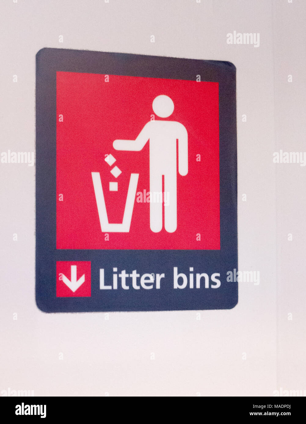 train sign litter bins icon wall close up macro detail; essex; england ...