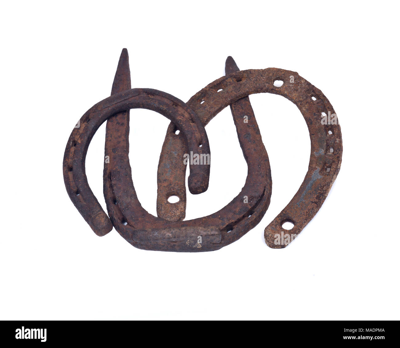Old rusty vintage good luck horseshoe isolated on white background ...