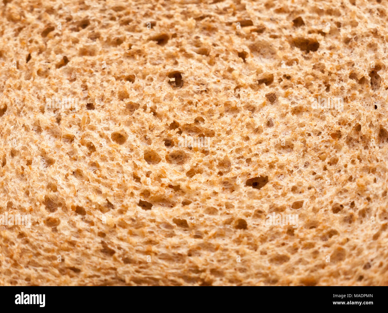 close up texture of brown rye bread macro detail food; essex; england