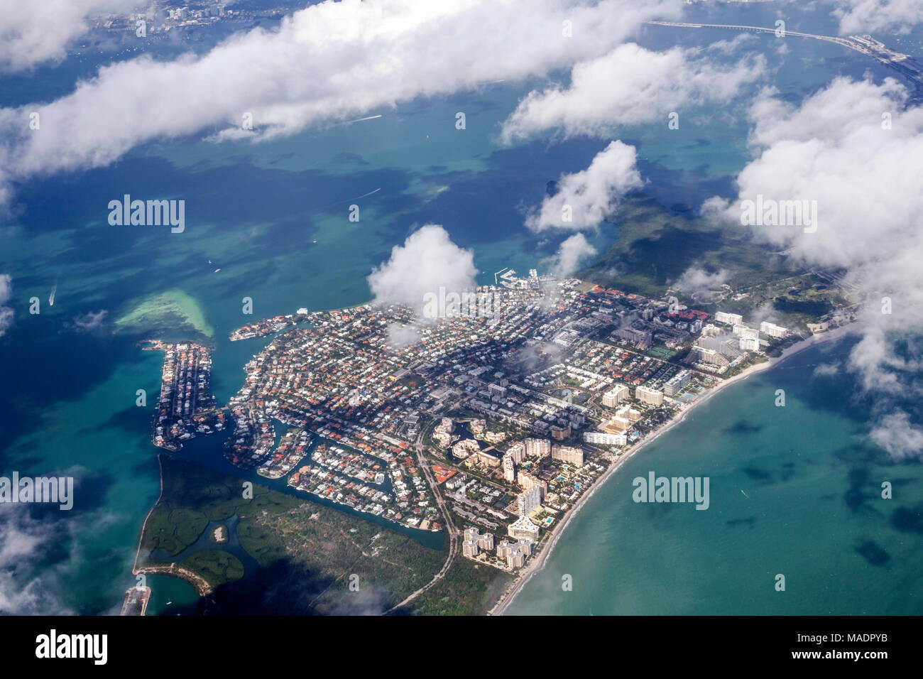Miami Florida,International Airport MIA,departing flight window seat view,Key Biscayne,aerial overhead view from above,FL171117036 Stock Photo