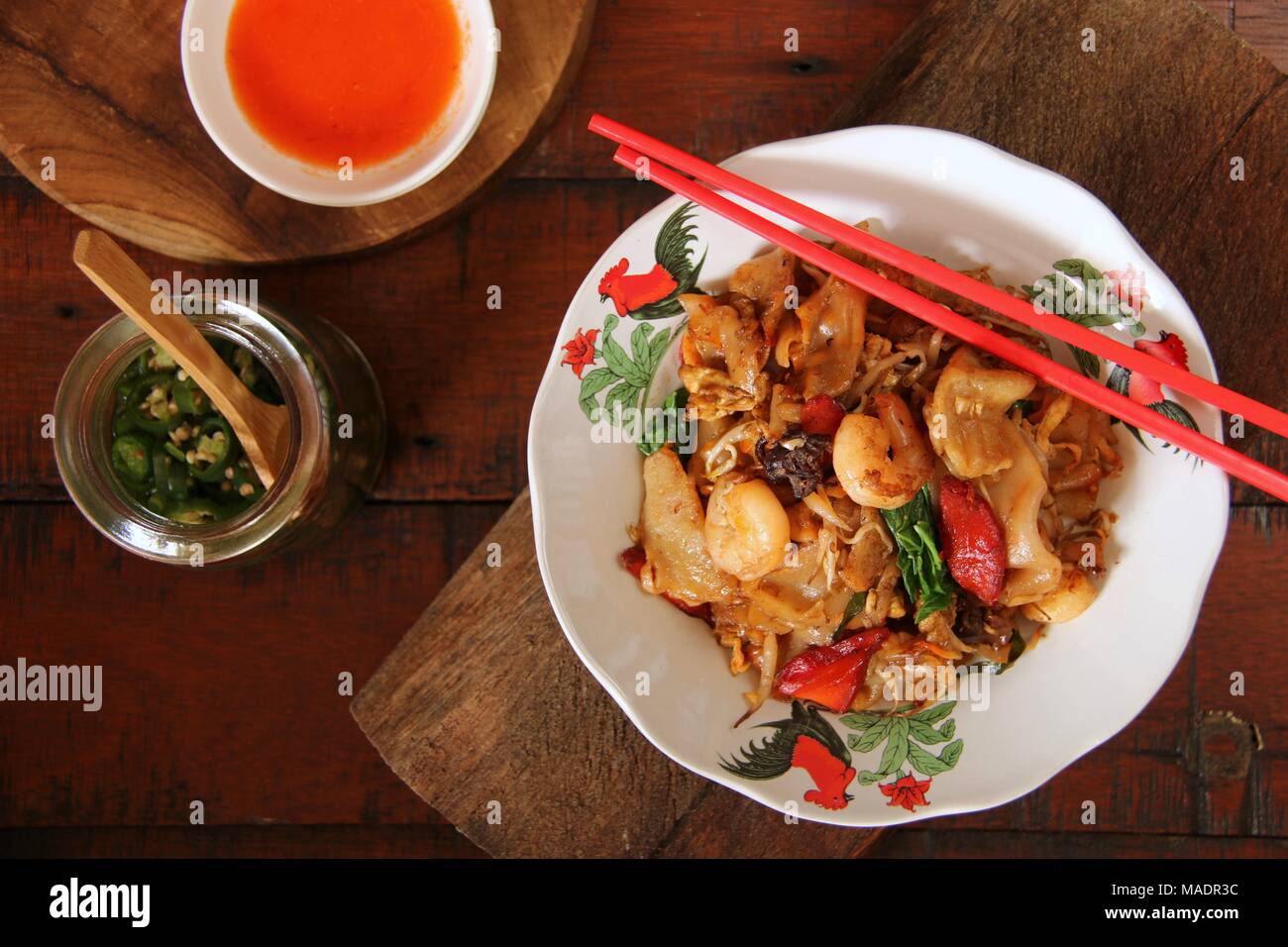 Fried Kway Teow A Popular Street Food Dish Of Stir fried Flat Rice fried-kway-teow-a-popular-street-food-dish-of-stir-fried-flat-rice
