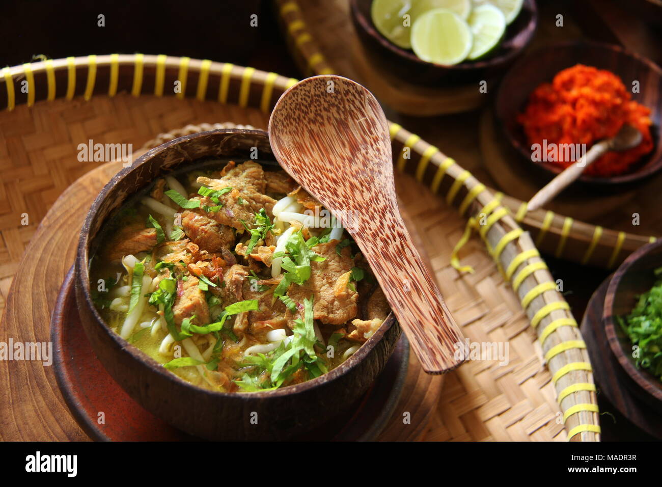 Soto Batok, the Javanese Beef Soup Served in Coconut Shell Bowl Stock Photo