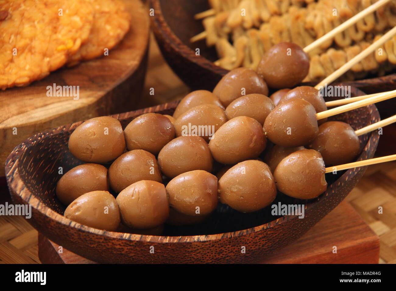 Sate Telur Puyuh, a Javanese traditional dish of braised quail egg satays; commonly served with Javanese soup dish. Stock Photo