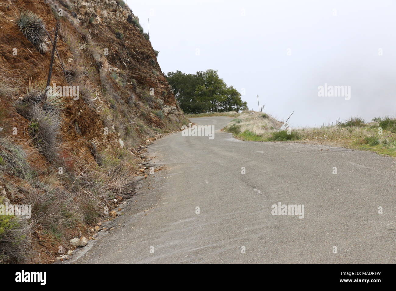 Nacimiento Fergusson Road, dramatic road winding down to Highway 1 at  Big Sur, California. Stock Photo