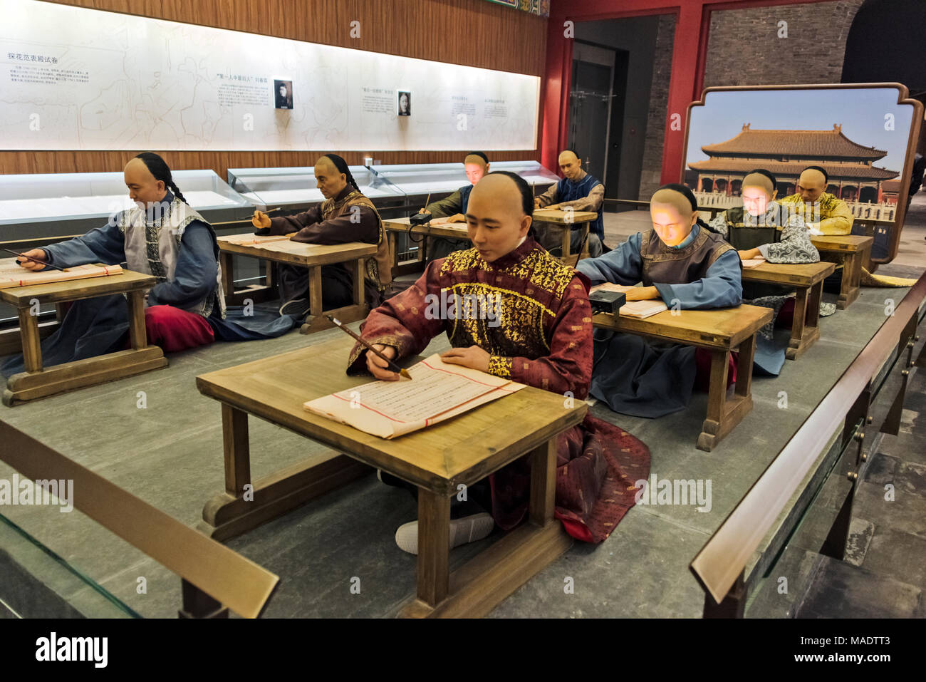 Display showing students taking the Imperal Examination druing the Qing Dynasty in Museum of Chinese Imperial Examination, Nanjing, Jiangsu Province,  Stock Photo