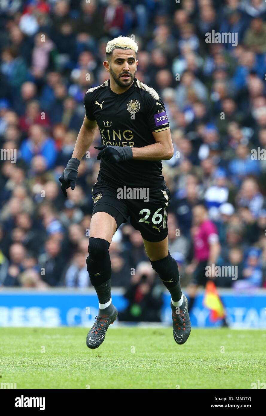 Riyad Mahrez of Leicester during the Premier League match between Brighton and Hove Albion and Leicester City at the American Express Community Stadium in Brighton and Hove. 31 Mar 2018 *** Editorial use only. No merchandising. For Football images FA and Premier League restrictions apply inc. no internet/mobile usage without FAPL license - for details contact Football Dataco *** Stock Photo