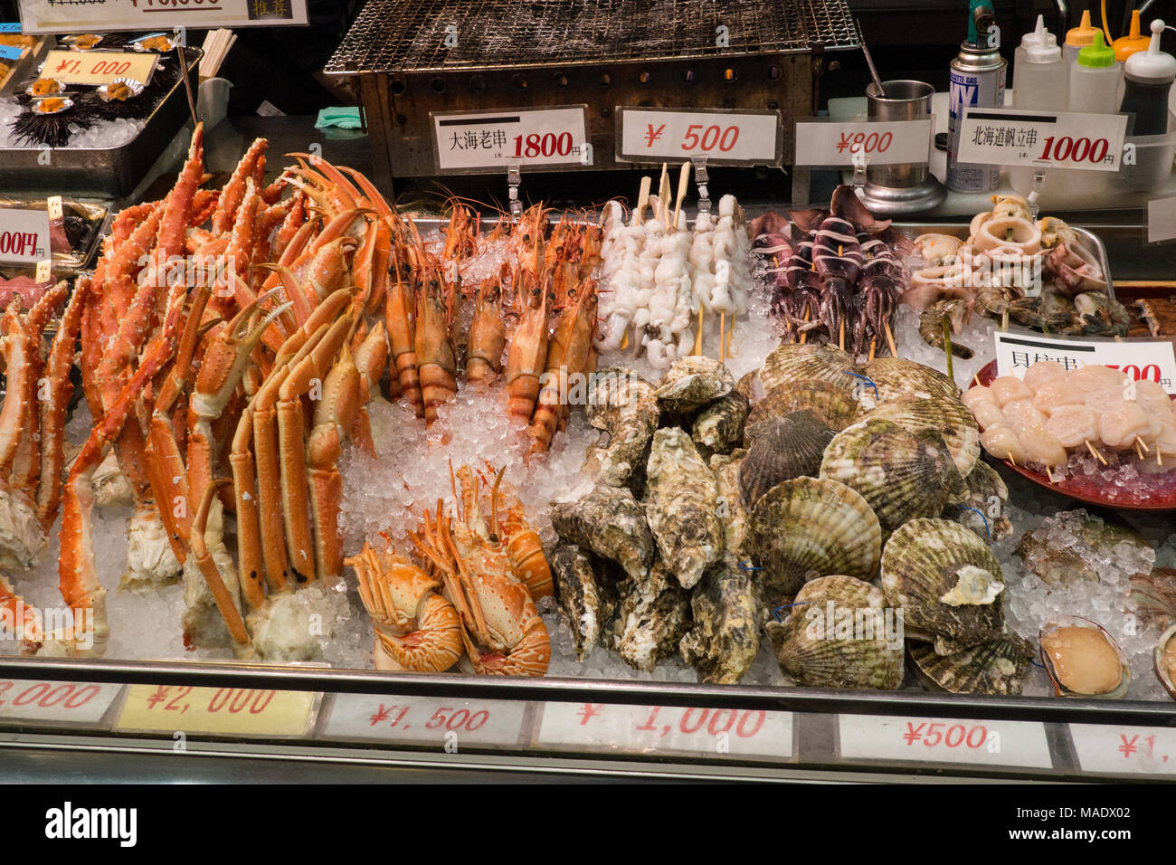 An assortment of seafood being sold at the famous Kuromon Fish Market in Osaka Stock Photo