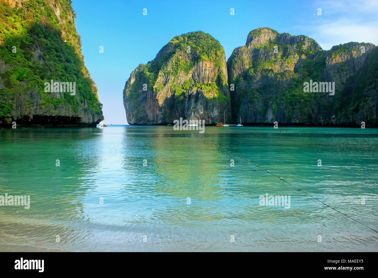 Maya Bay surrounded by limestone cliffs on Phi Phi Leh Island, Krabi Province, Thailand. It is part of Mu Ko Phi Phi National Park. Stock Photo